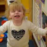 Blonde toddler girl in child care setting 