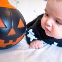 baby under four months old dressed for halloween 