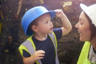 Boy in a hard hat.