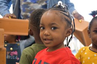 Young child looking directly at camera. 