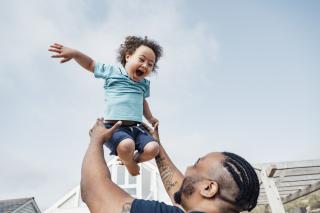 Dad and son playing. 