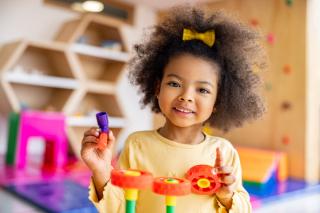 Little girl at kindergarten.