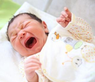 Newborn baby boy crying 