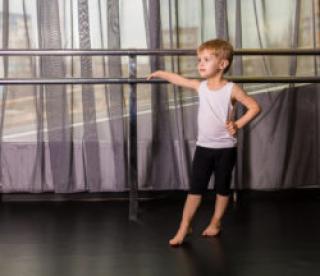 Little boy dancer in a dance studio 