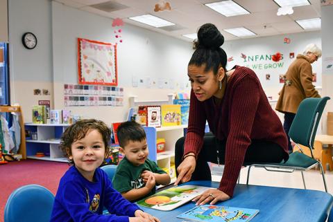 Two boys learning in a Family Support Center. 