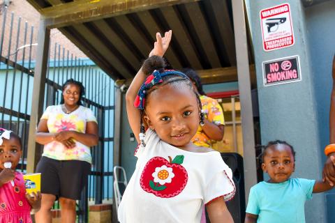 Little girl posing for the camera at her Early Head Start site. 